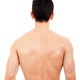 A mans bare back, from head down to just above the hips